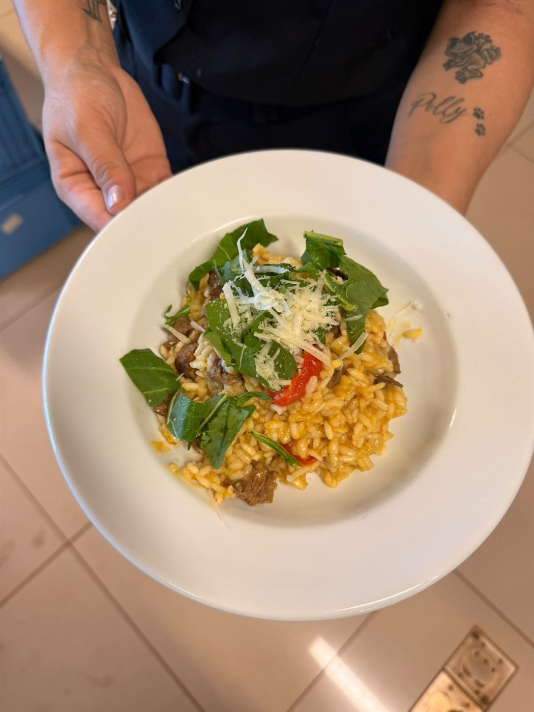 Prato de risoto servido pela equipe